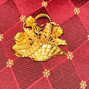 Gold tone Roses in a basket brooch with dainty faux pearls.